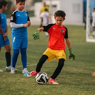 Young Boy Kicking Soccer Ball | Kids Football Fun