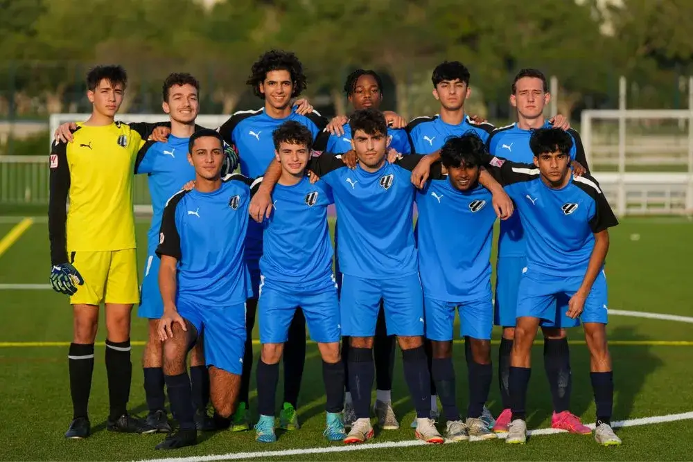 Young Men in Blue Soccer Uniforms | Football Training for Beginners Near Me