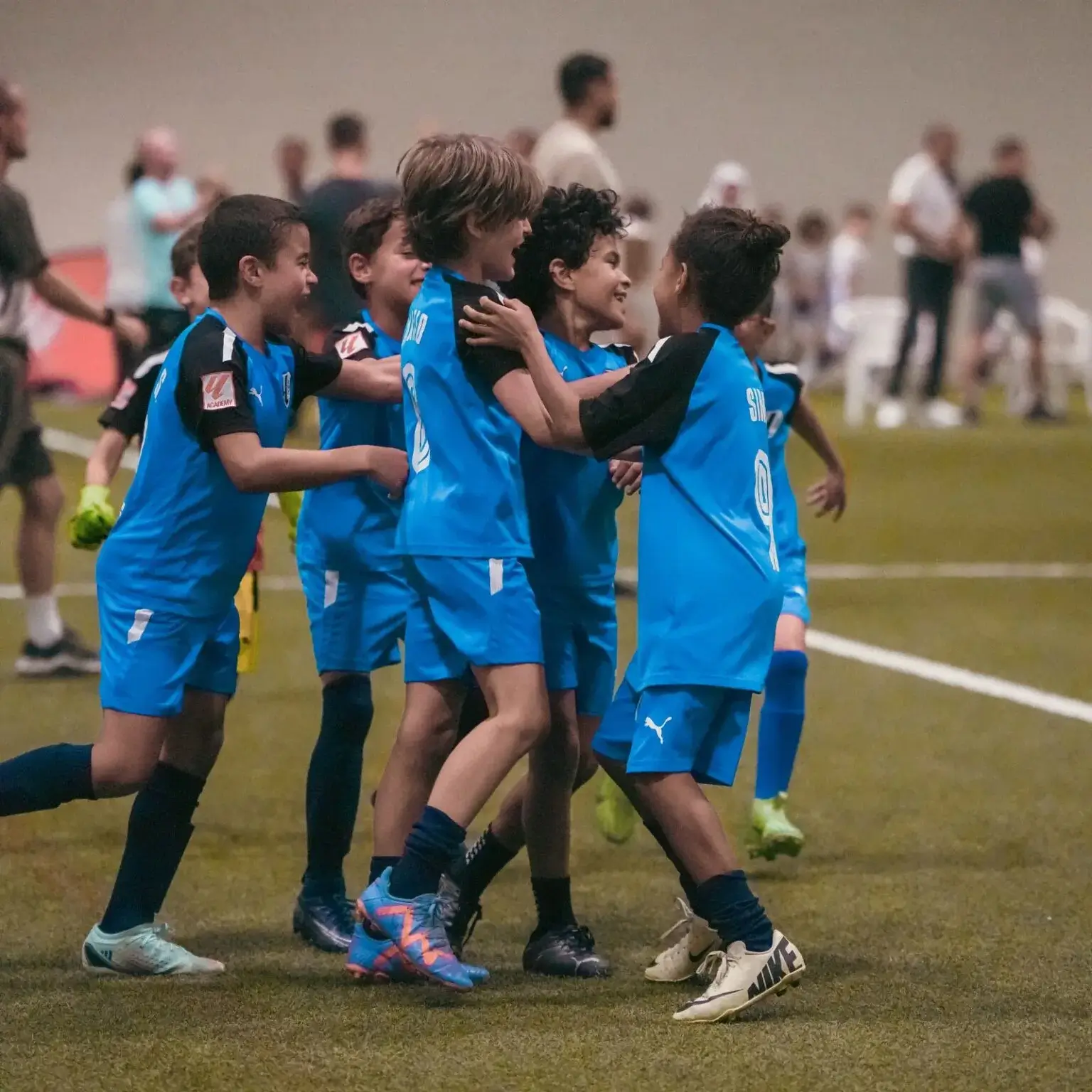 DOFA Season 2023 | Children happily celebrating on the soccer field after winning match